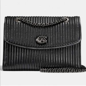 Coach Parker quilted with rivets